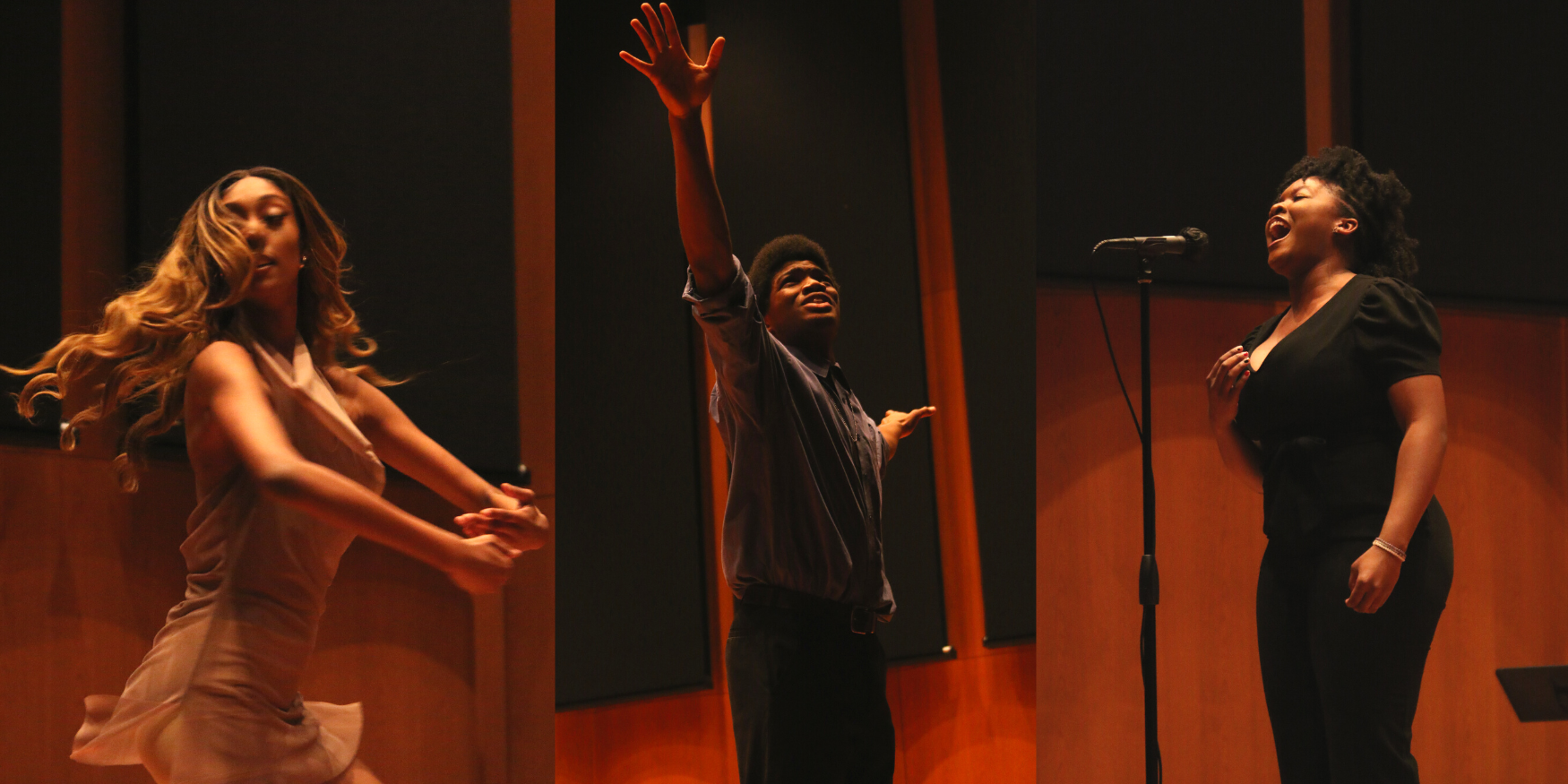 From left to right, there is a Black dancer with her arms rounded in front of her, her hair tossed behind her. She is wearing a neutral color outfit and pictured mid-move. Next to her is a Black male poet wearing a grey shirt and black pants, his arms reaching above his head. Next to him is a Black female singer waring concert black, singing passionately into the microphones.